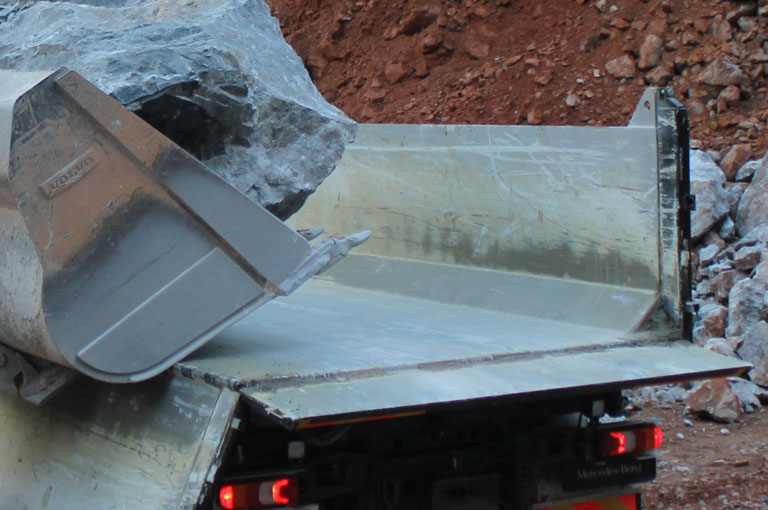 Loading rock tipper